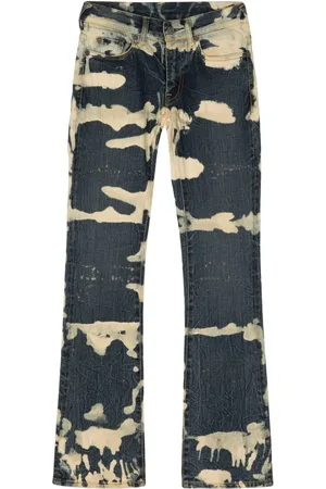 Stain Shade Vaqueros bootcut con efecto lavado