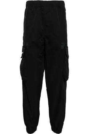 A Bathing Ape Pantalones ajustados con aplique del logo