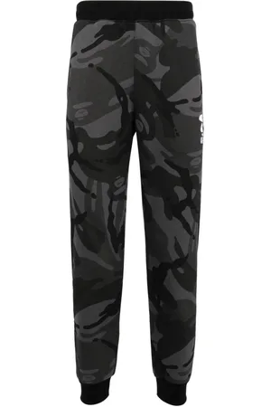 A Bathing Ape Pantalones de chándal con estampado militar