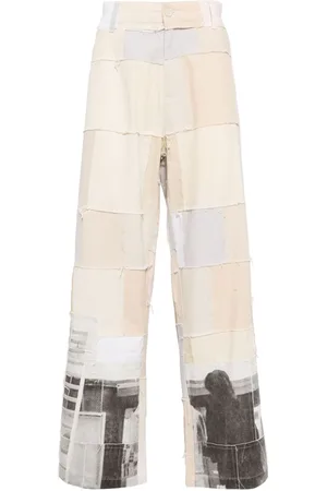 KIDSUPER STUDIOS Pantalones con estampado gráfico
