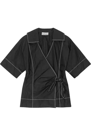 Ganni Blusa cruzada con lazo lateral