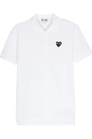 Comme des Garçons Polo con aplique del logo