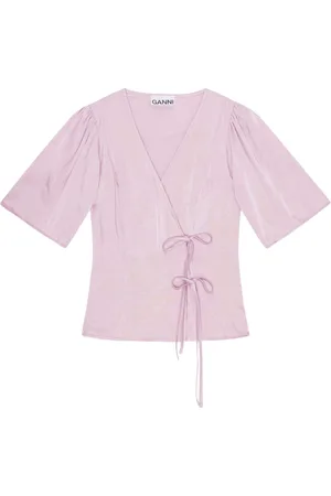 Ganni Blusa cruzada con cuello en V