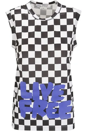 Comme des Garçons Top con eslogan