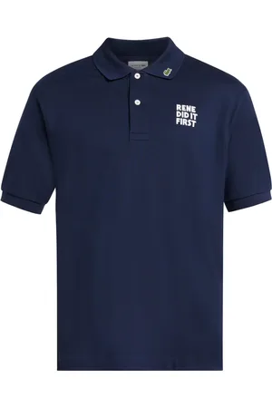 Lacoste Polo con eslogan bordado