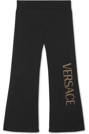 VERSACE Pantalones acampanados con logo