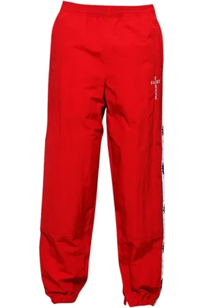 SAINT MXXXXXX Pantalones de chándal con franja del logo