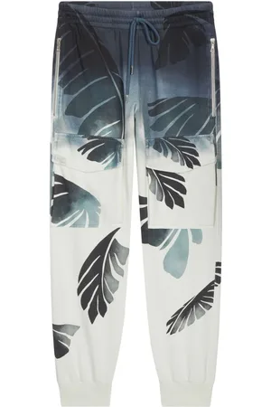 DRIES VAN NOTEN Pantalones con estampado Palm