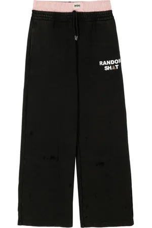 Natasha Zinko Pantalones a capas con logo estampado