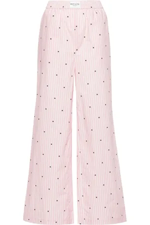 ROTATE Pantalones rectos a rayas con logo