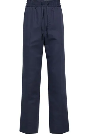 BRIONI Pantalones ajustados de talle medio