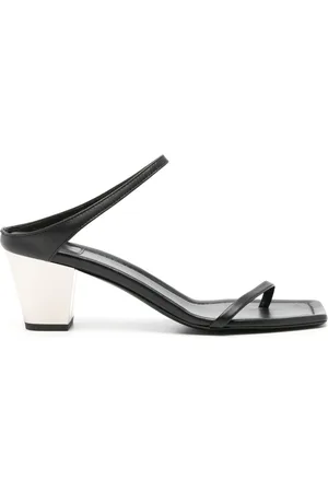 Totême Mules City con tacón de 60 mm