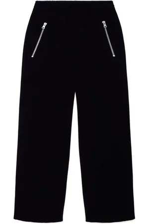Maison Margiela Pantalones con costuras del logo