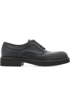 Salvatore Ferragamo Zapatos Derby con logo en relieve