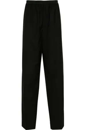 Balenciaga Pantalones holgados con logo en la cintura