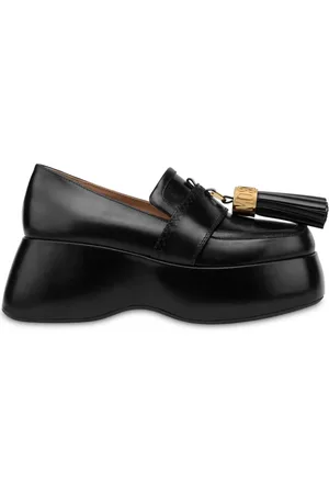 Moschino Mocasines con charm de borlas