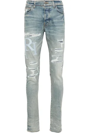 AMIRI Vaqueros skinny con logo