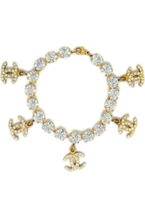 CHANEL Pulsera con detalles de strass y logo CC 1996