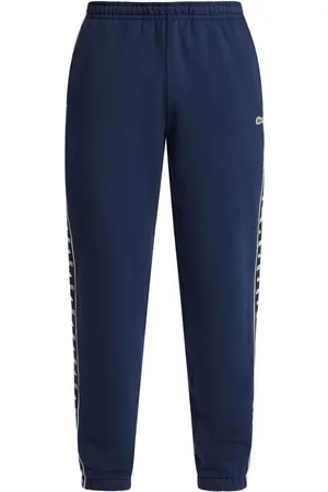 Lacoste Pantalones de chándal con franjas del logo