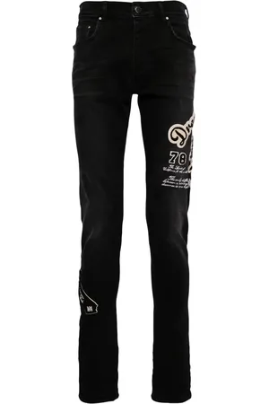 AMIRI Vaqueros skinny de talle medio
