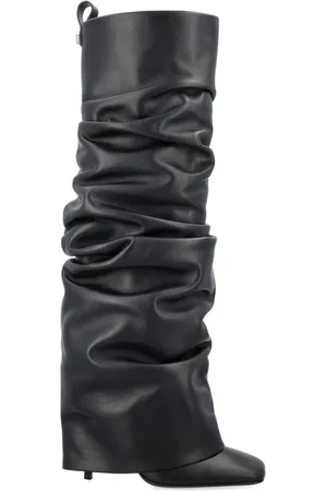 The Attico Botas altas a capas