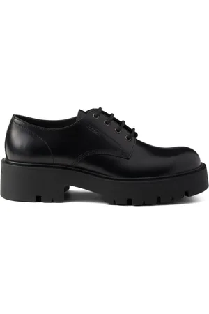 Prada Zapatos derby con suela gruesa