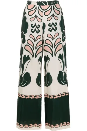 Adriana Degreas Pantalones acampanados con estampado gráfico