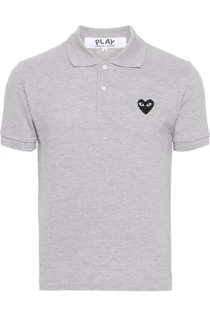 Comme des Garçons Polo con parche Heart