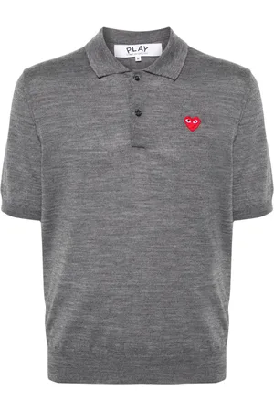 Comme des Garçons Polo con parche de corazón