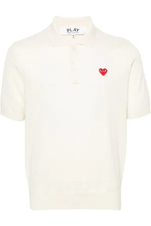 Comme des Garçons Polo con parche de corazón
