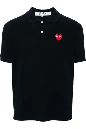 Comme des Garçons Polo con parche de corazón