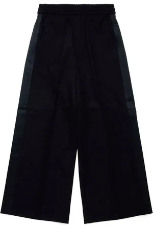 Maison Margiela Pantalones anchos con rayas laterales