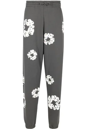 DENIM TEARS Pantalones de chándal con estampado Rhinestone Cotton Wreath