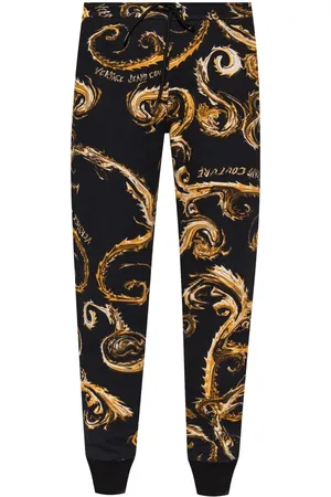 VERSACE Pantalones de chándal con logo estampado