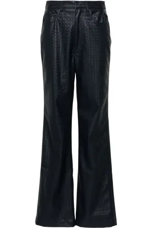 ROTATE Pantalones rectos con diseño trenzado