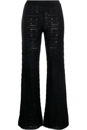 Givenchy Pantalones acampanados con logo en intarsia