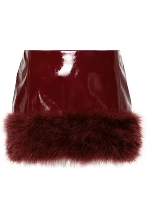 BLUMARINE Falda corta con aplique de plumas