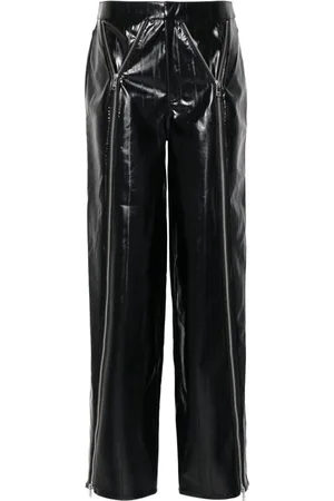 ROTATE Pantalones con detalle de cremalleras