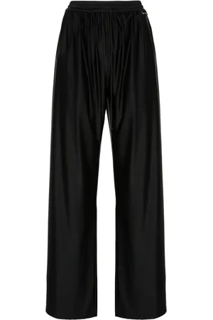 Marine Serre Pantalones con diseño acampanado