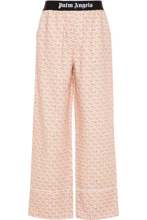 Palm Angels Pantalones con frutas estampadas