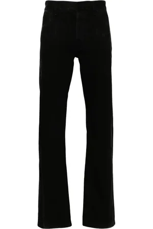 Alexander McQueen Vaqueros con parche del logo