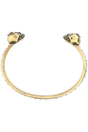 Alexander McQueen Brazalete con motivo de calaveras