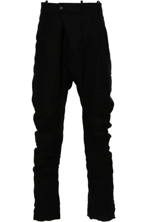 MASNADA Pantalones con efecto envejecido