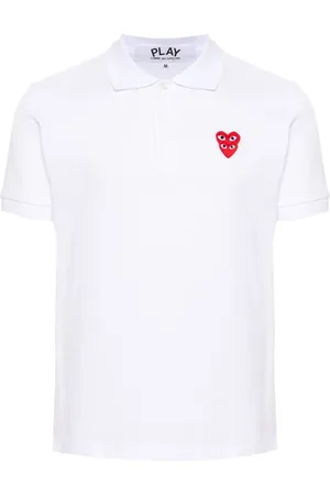 Comme des Garçons Polo con parche de corazón