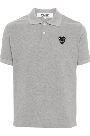 Comme des Garçons Polo con parche de corazón