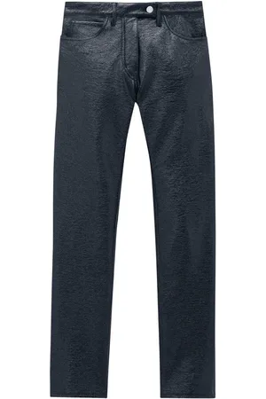 Courrèges Pantalones slim de vinilo