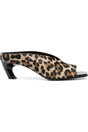 Alexander McQueen Mules Armadillo con tacón de 65 mm
