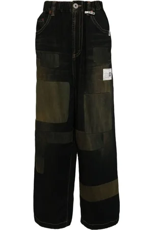 Maison Mihara Yasuhiro Vaqueros con diseño patchwork