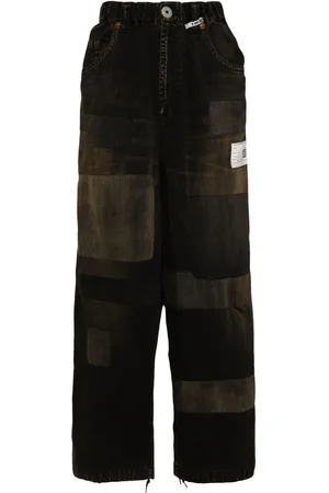 Maison Mihara Yasuhiro Vaqueros con diseño patchwork