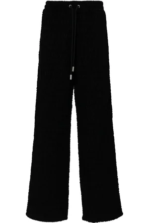 OFF-WHITE Pantalones anchos con logo